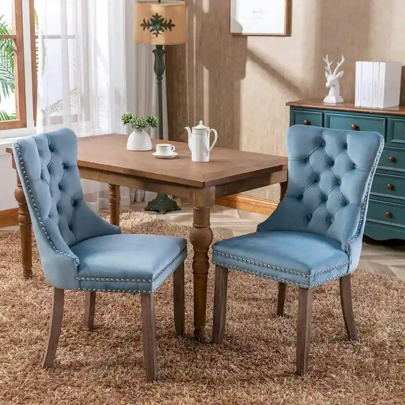 Juego de 2 sillas de comedor tapizadas con ribete de tachuelas y patas de madera maciza